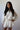 Cream Textured Long Sleeve Pom Trim Romper