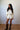 Cream Textured Long Sleeve Pom Trim Romper